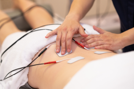 Woman receiving biofeedback for pelvic floor therapy