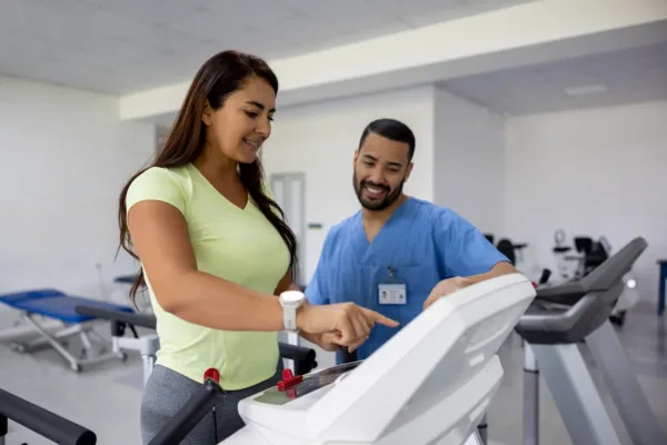 Woman working on physical therapy with instructor